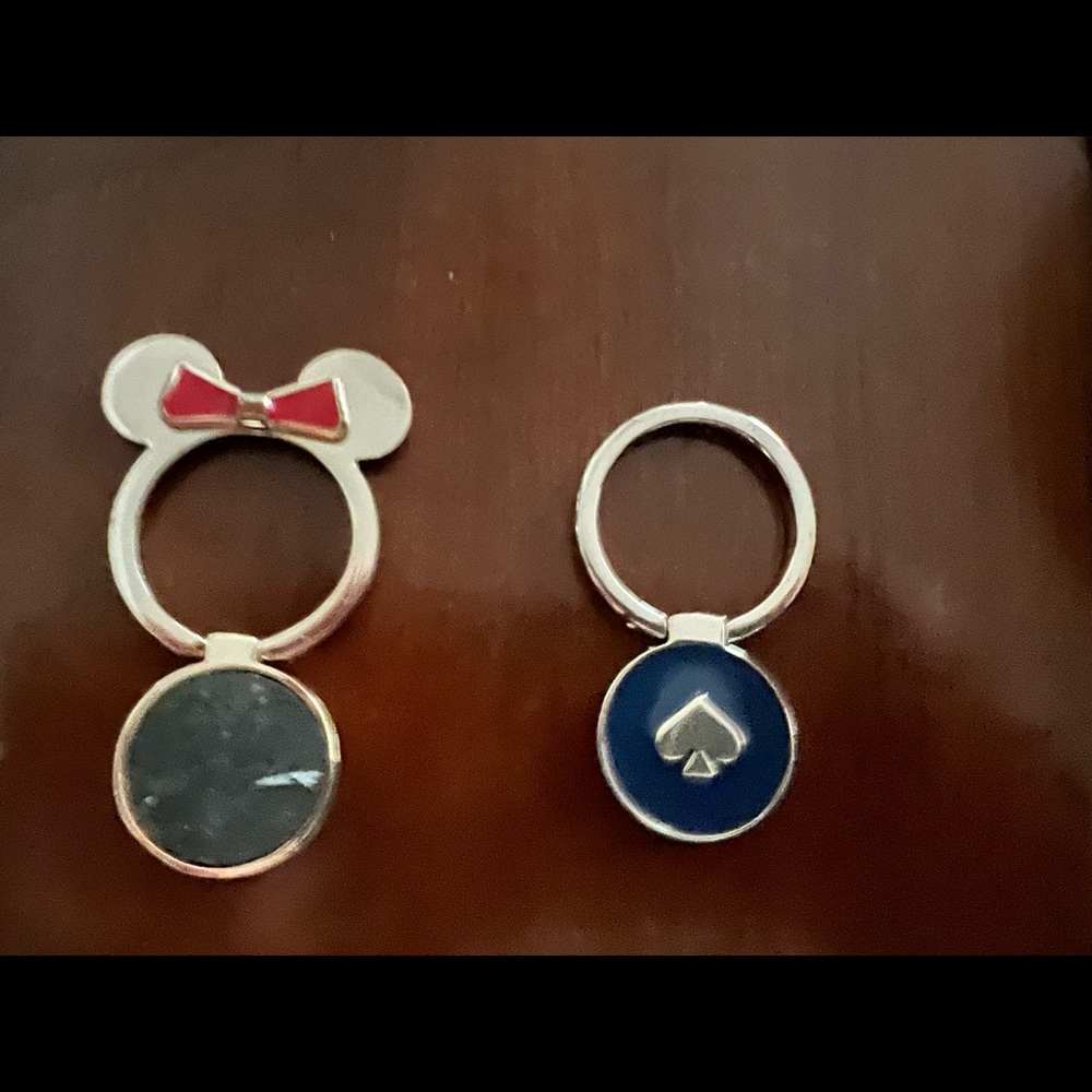 2 Kate spade pop sockets for cell phones.